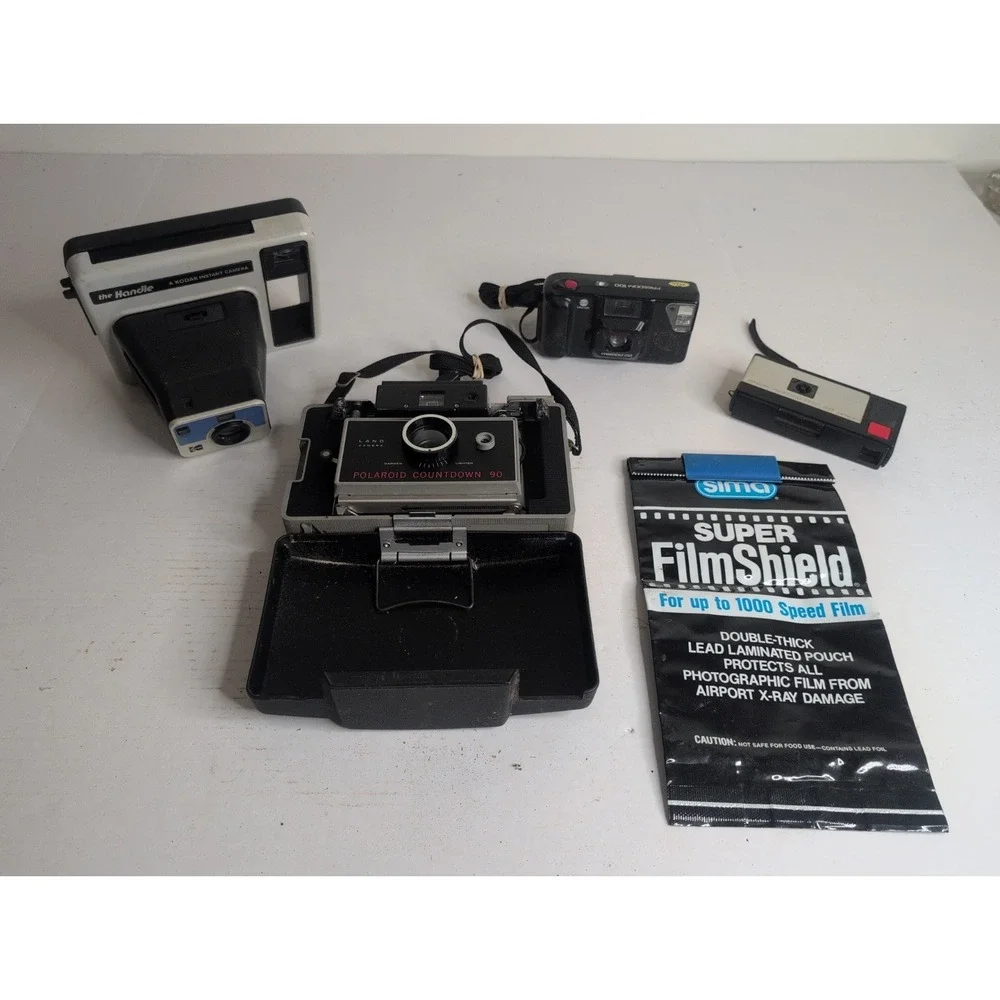 Vtg Camera Lot Kodak Handle Instamatic 20 Minolta Freedom 100 Polaroid 90 Sima